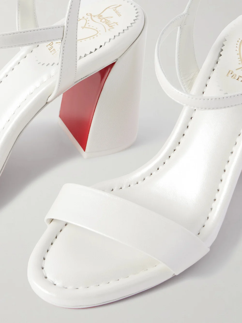 Close-up detail of the Christian Louboutin Miss Jane 85 Pearlescent Leather Sandals