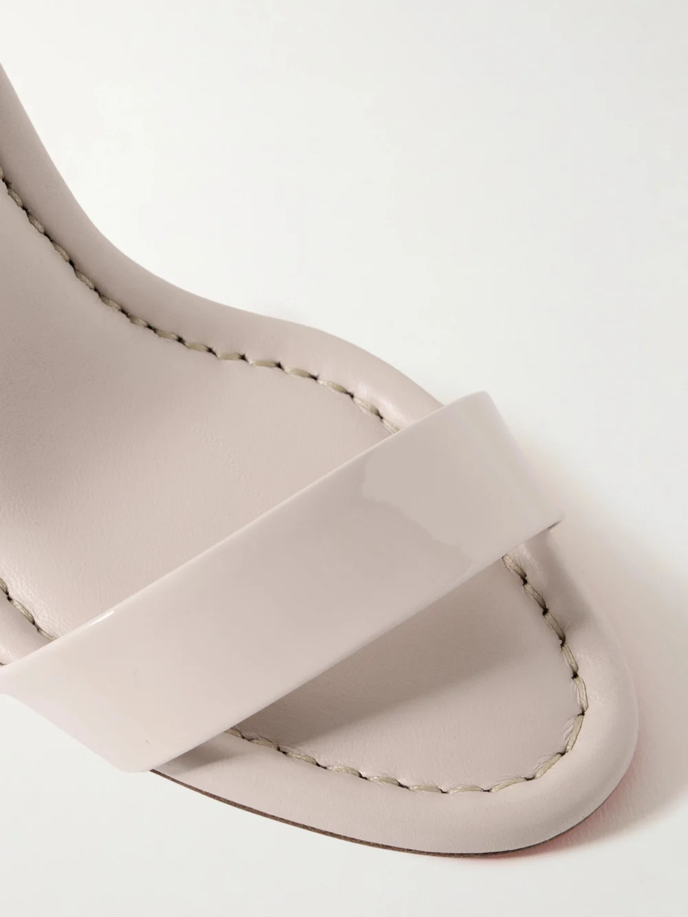 Close-up detail of the Christian Louboutin Miss Sabina 85 Patent-leather Sandals