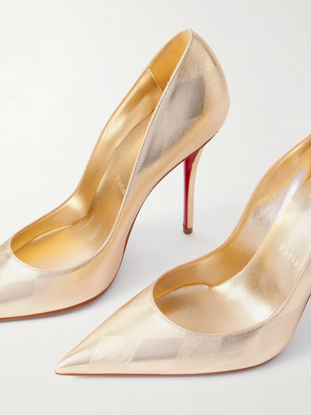 Close-up detail of the Christian Louboutin Miss Z 100 Argyl Metallic Leather Pumps