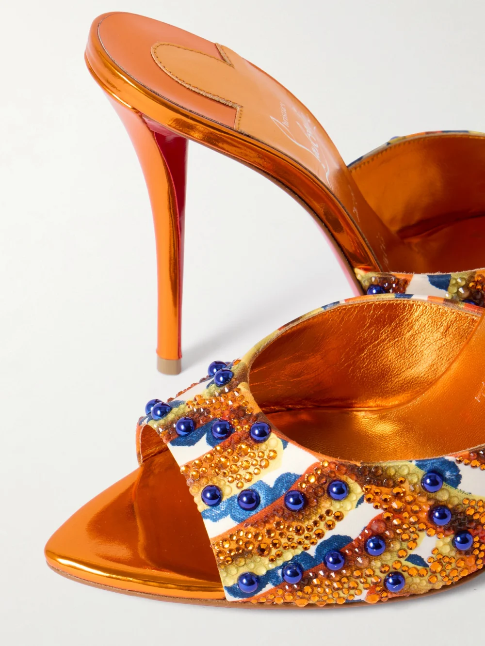 Close-up detail of the Christian Louboutin Miss Z 100 Embellished Printed Faille Mules