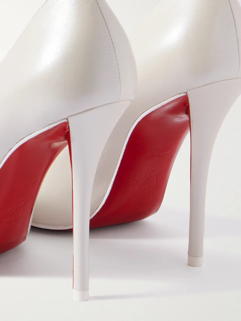 Close-up detail of the Christian Louboutin Miss Z 100 Leather Pumps