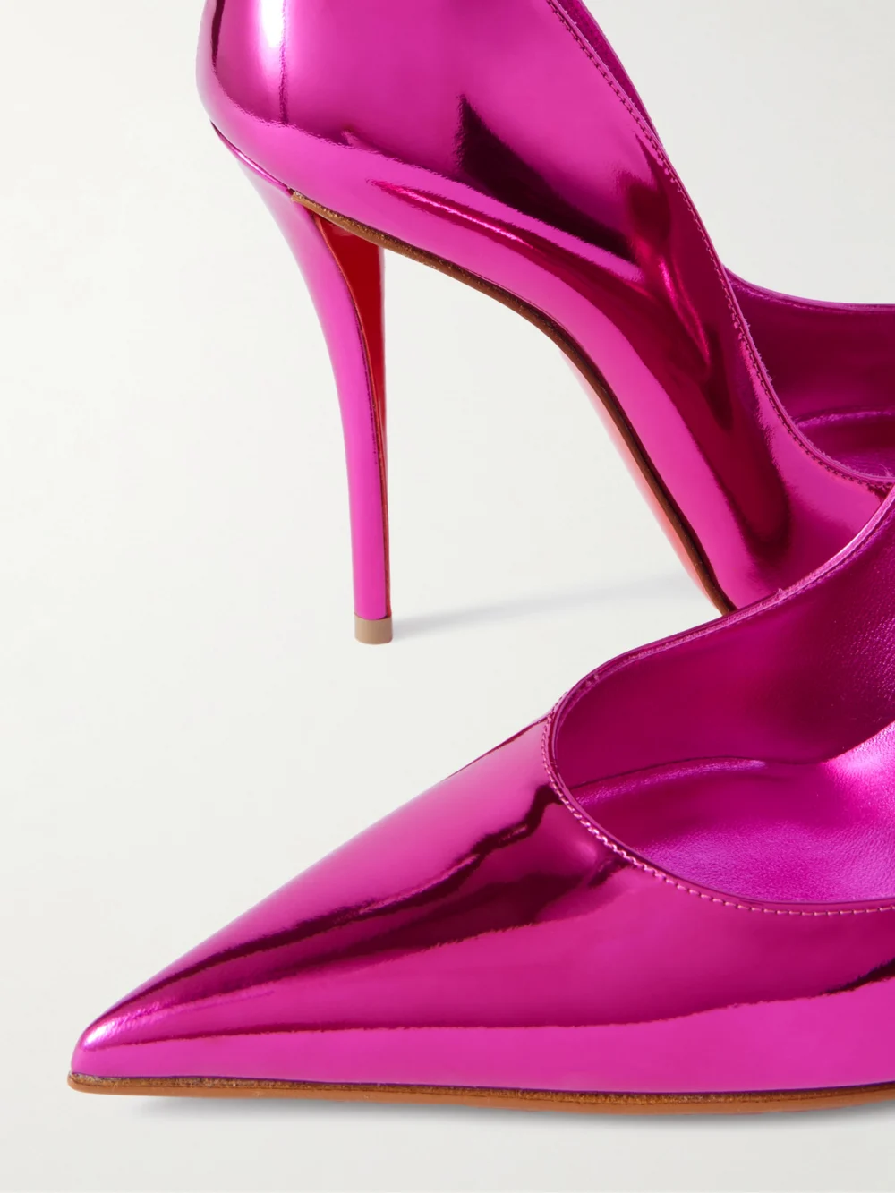 Close-up detail of the Christian Louboutin Miss Z 100 Mirrored-leather Pumps
