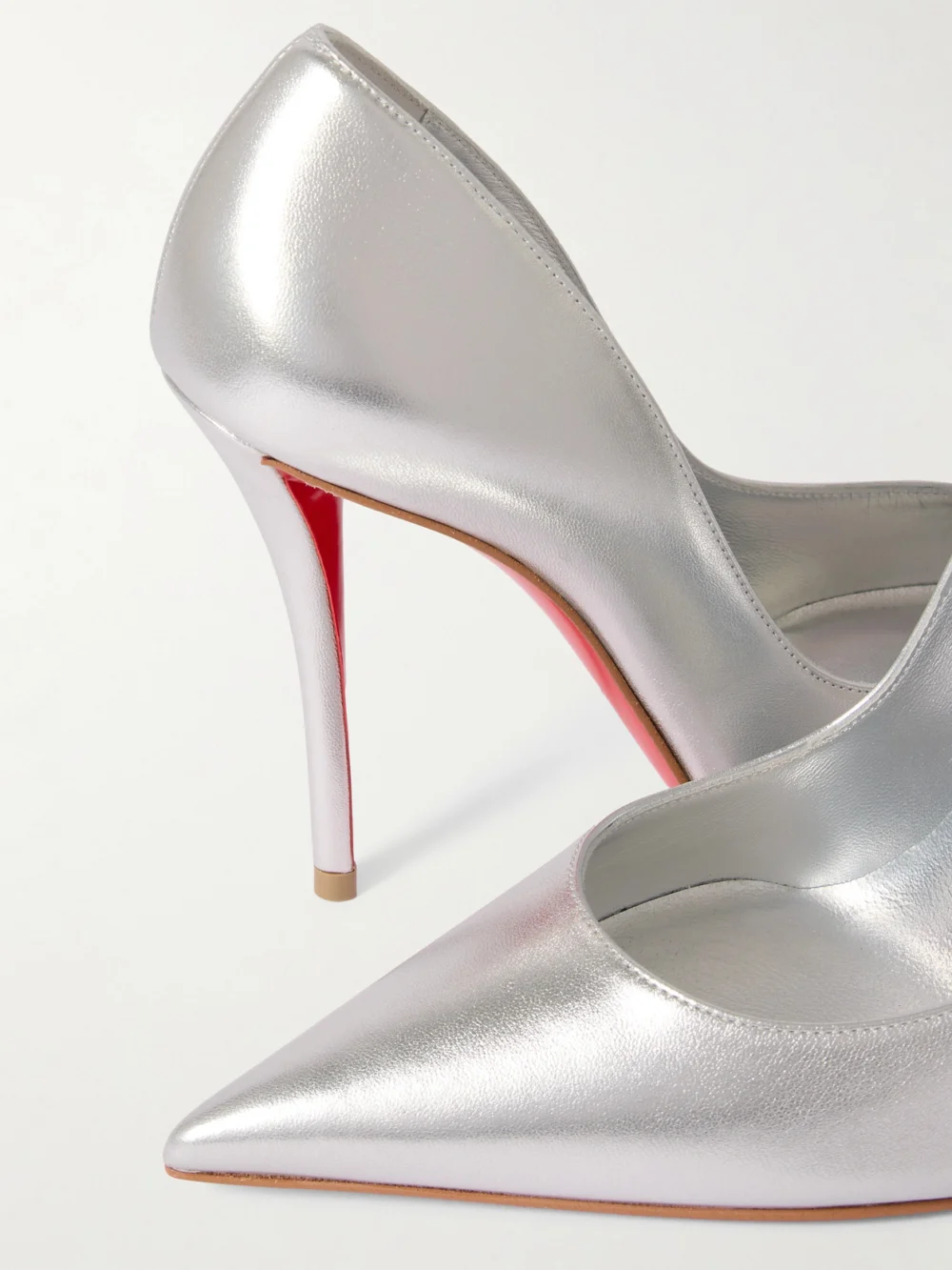 Close-up detail of the Christian Louboutin Miss Z 100 Mirrored-leather Pumps