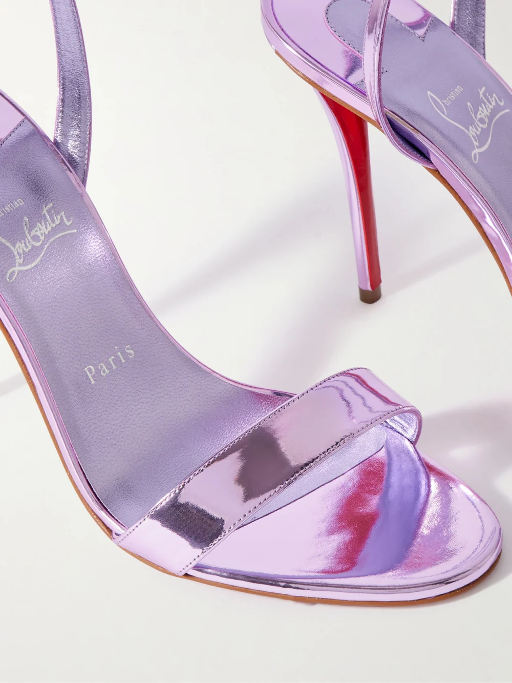 Close-up detail of the Christian Louboutin Miss Z 100 Mirrored-leather Sandals