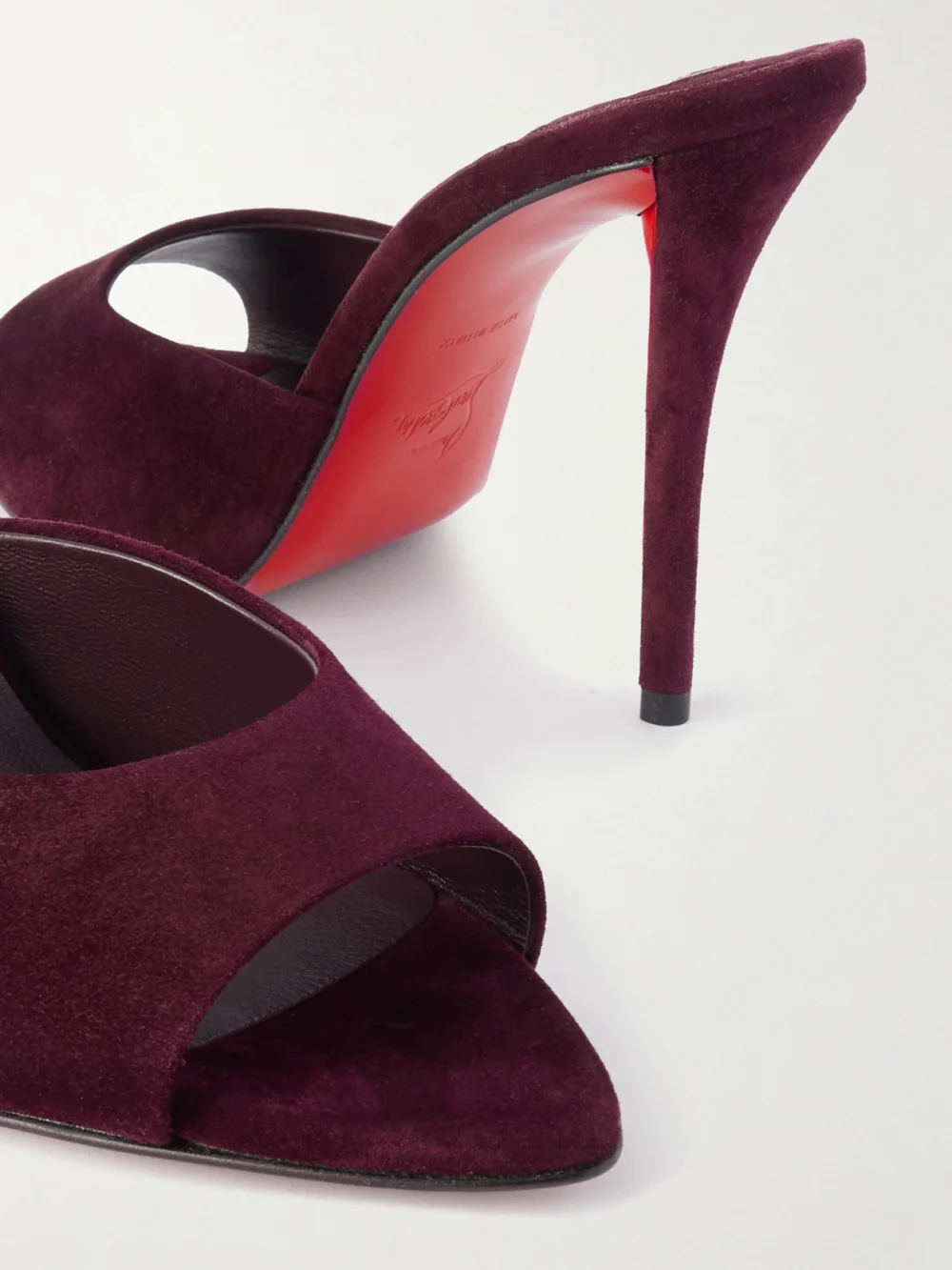 Close-up detail of the Christian Louboutin Miss Z 100 Suede Mules