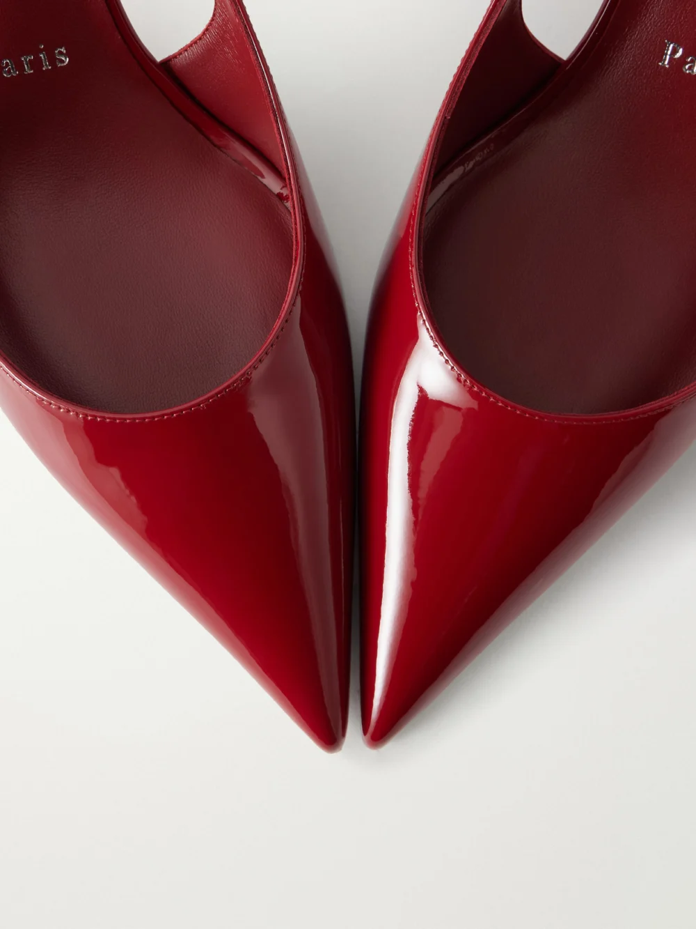 Close-up detail of the Christian Louboutin Miss Z 60 Patent Leather Pumps