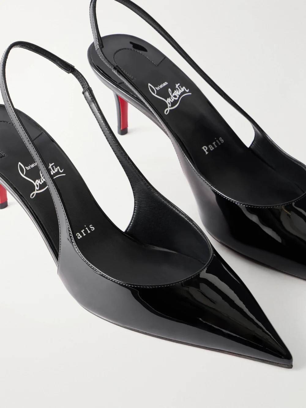 Close-up detail of the Christian Louboutin Miss Z 60 Patent-leather Slingback Pumps