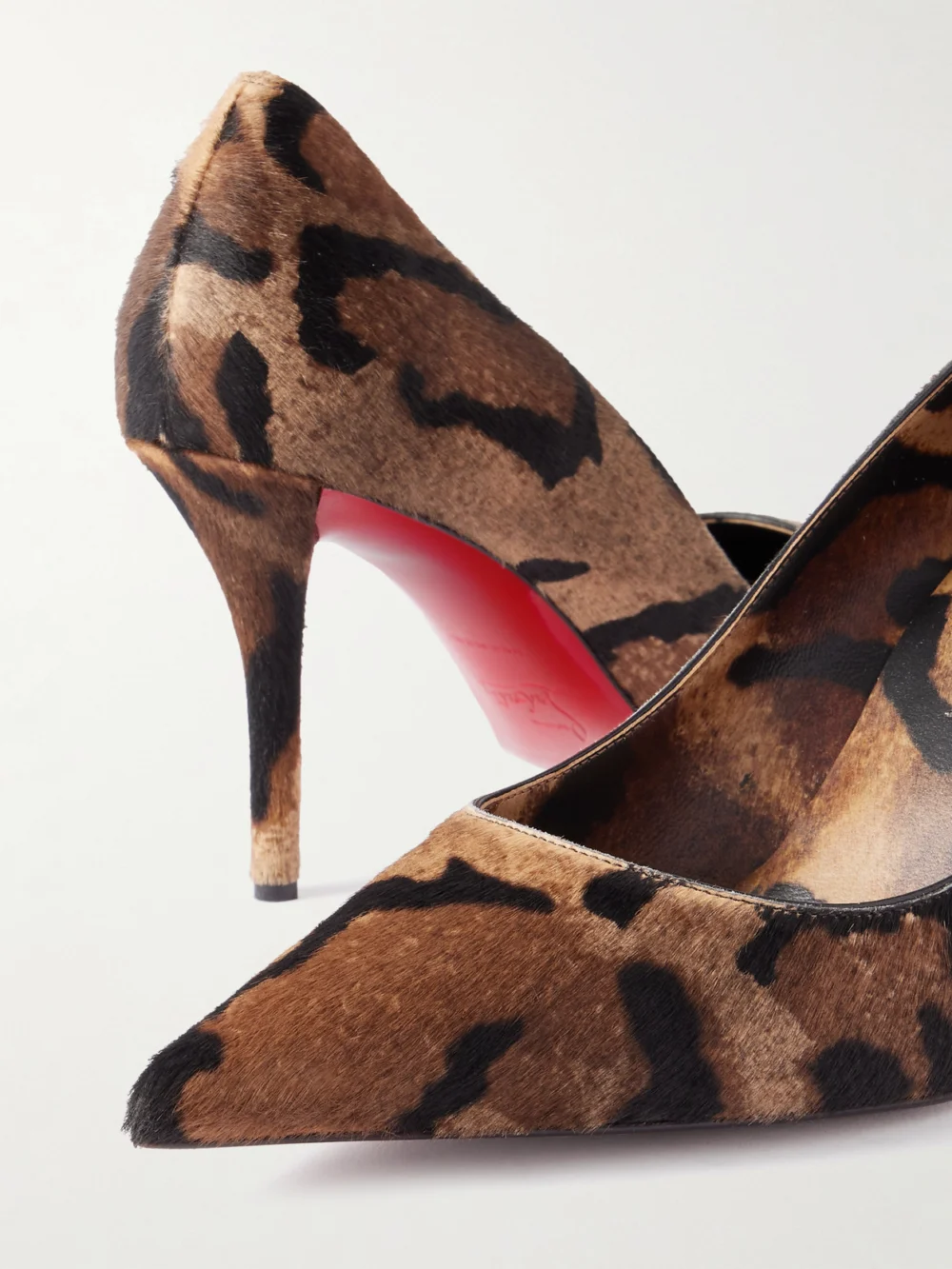 Close-up detail of the Christian Louboutin Miss Z 80 Leopard-print Calf Hair Pumps