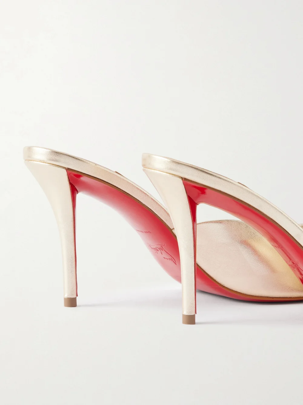 Close-up detail of the Christian Louboutin Miss Z 80 Metallic Leather Mules