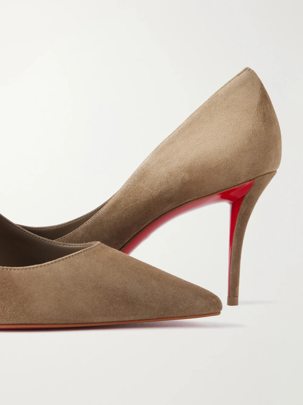 Close-up detail of the Christian Louboutin Miss Z 80 Suede Pumps