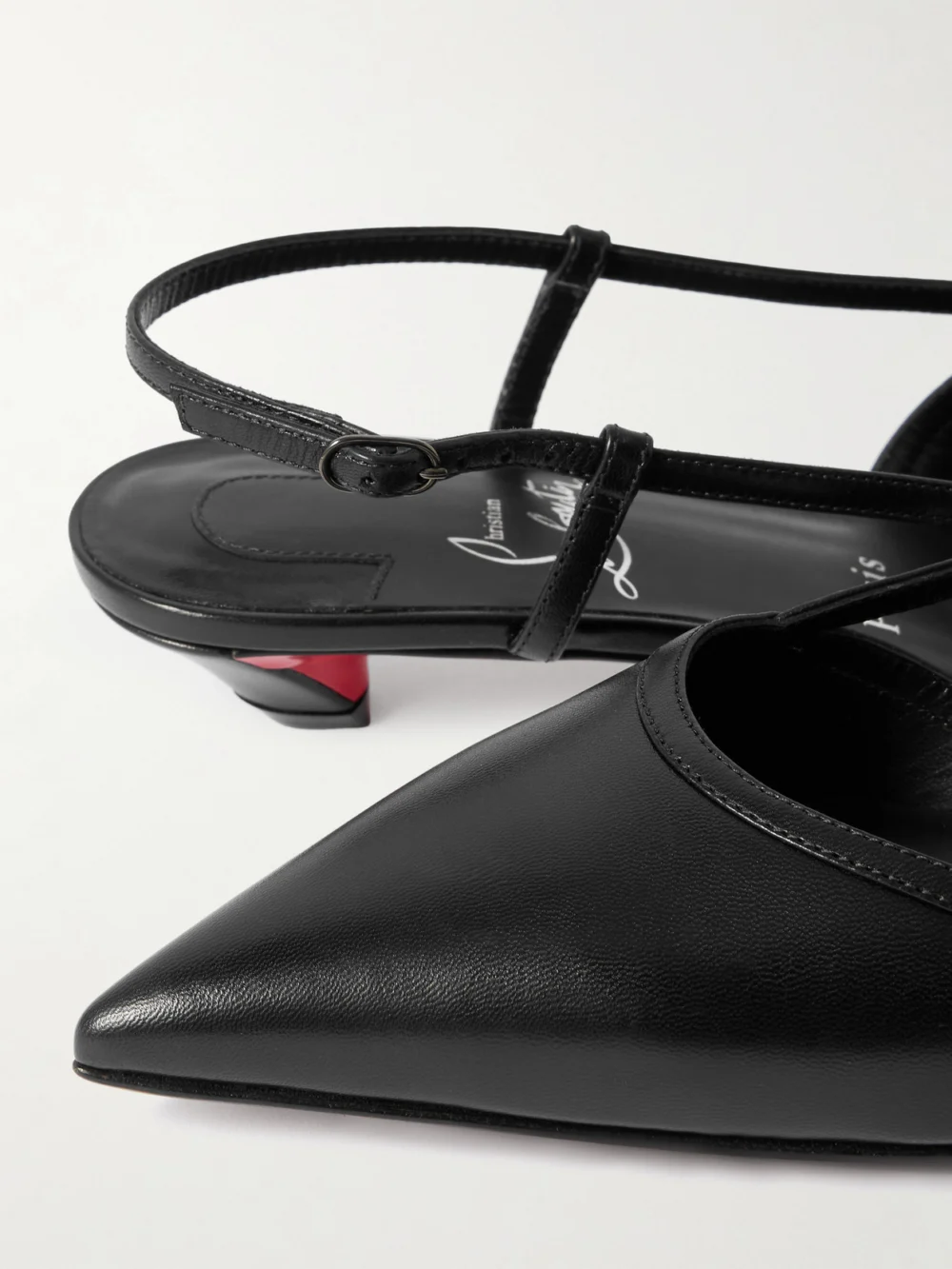 Close-up detail of the Christian Louboutin Miss Z Slingina 25 Leather Slingback Pumps