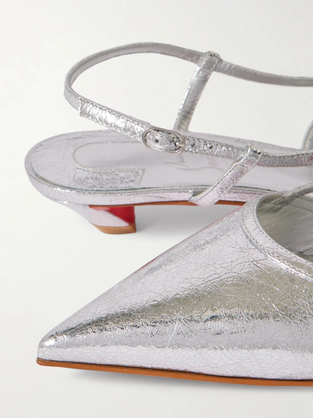 Close-up detail of the Christian Louboutin Miss Z Slingina 25 Metallic Crinkled-leather Slingback Pumps