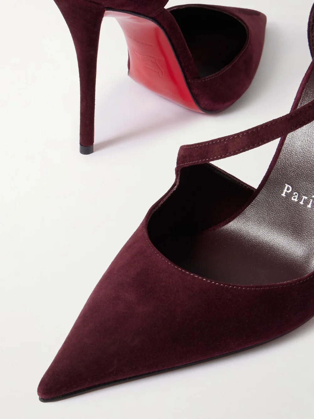 Close-up detail of the Christian Louboutin Miss Ziggyta 100 Suede Pumps