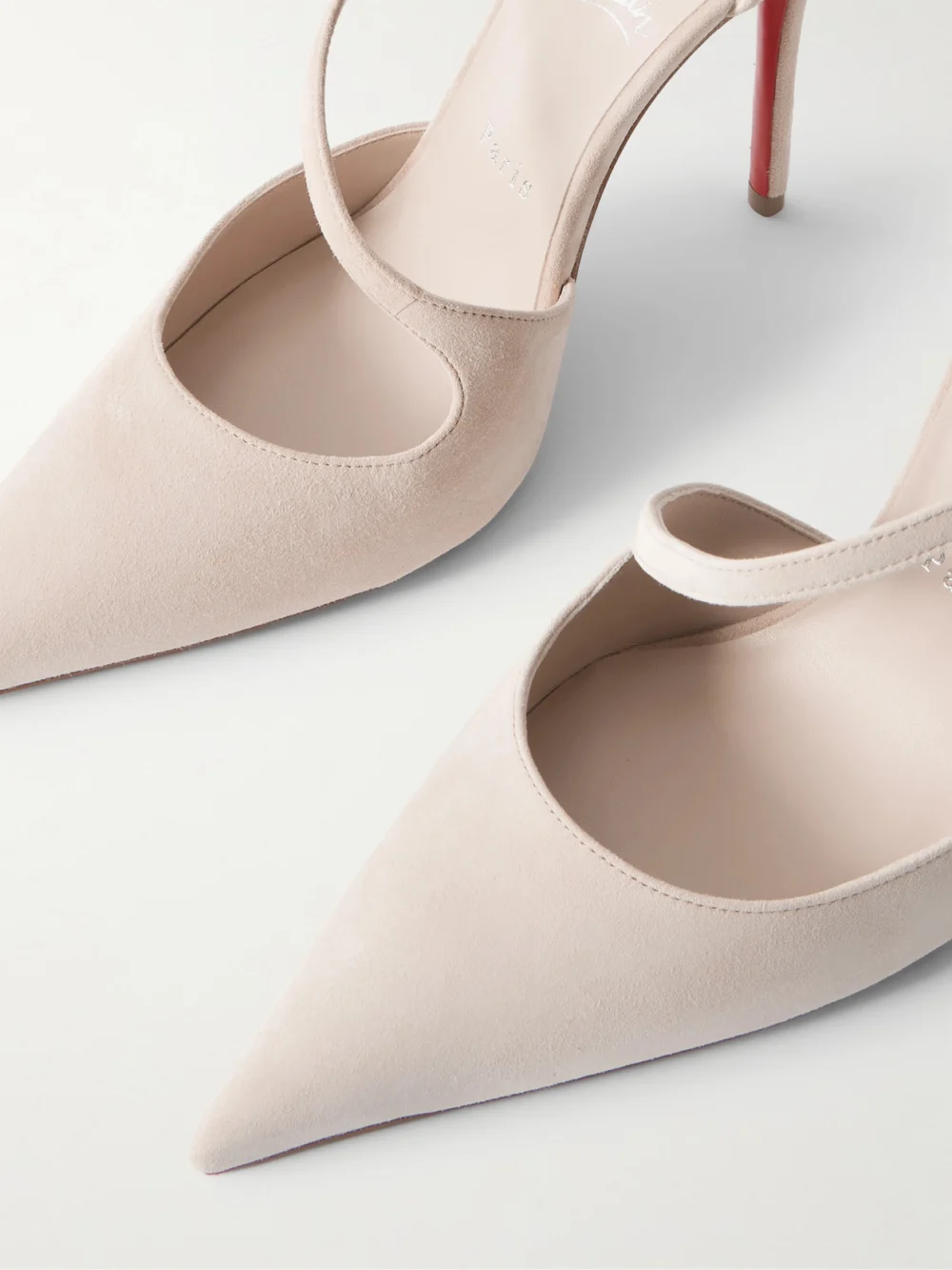 Close-up detail of the Christian Louboutin Miss Ziggyta 100 Suede Pumps