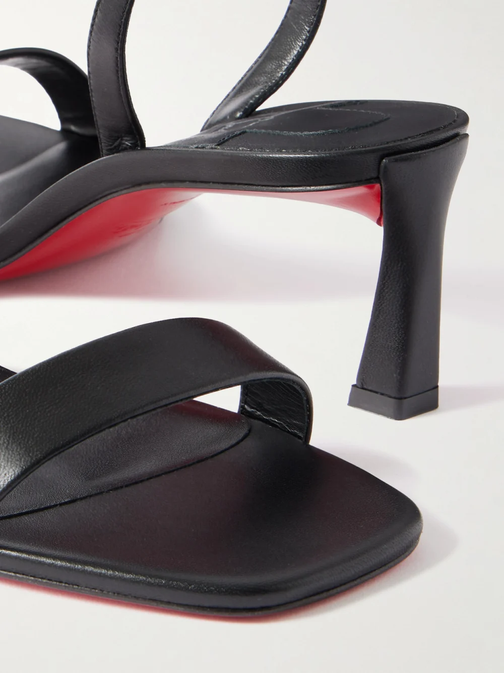 Close-up detail of the Christian Louboutin O Condora 55 Leather Slingback Sandals
