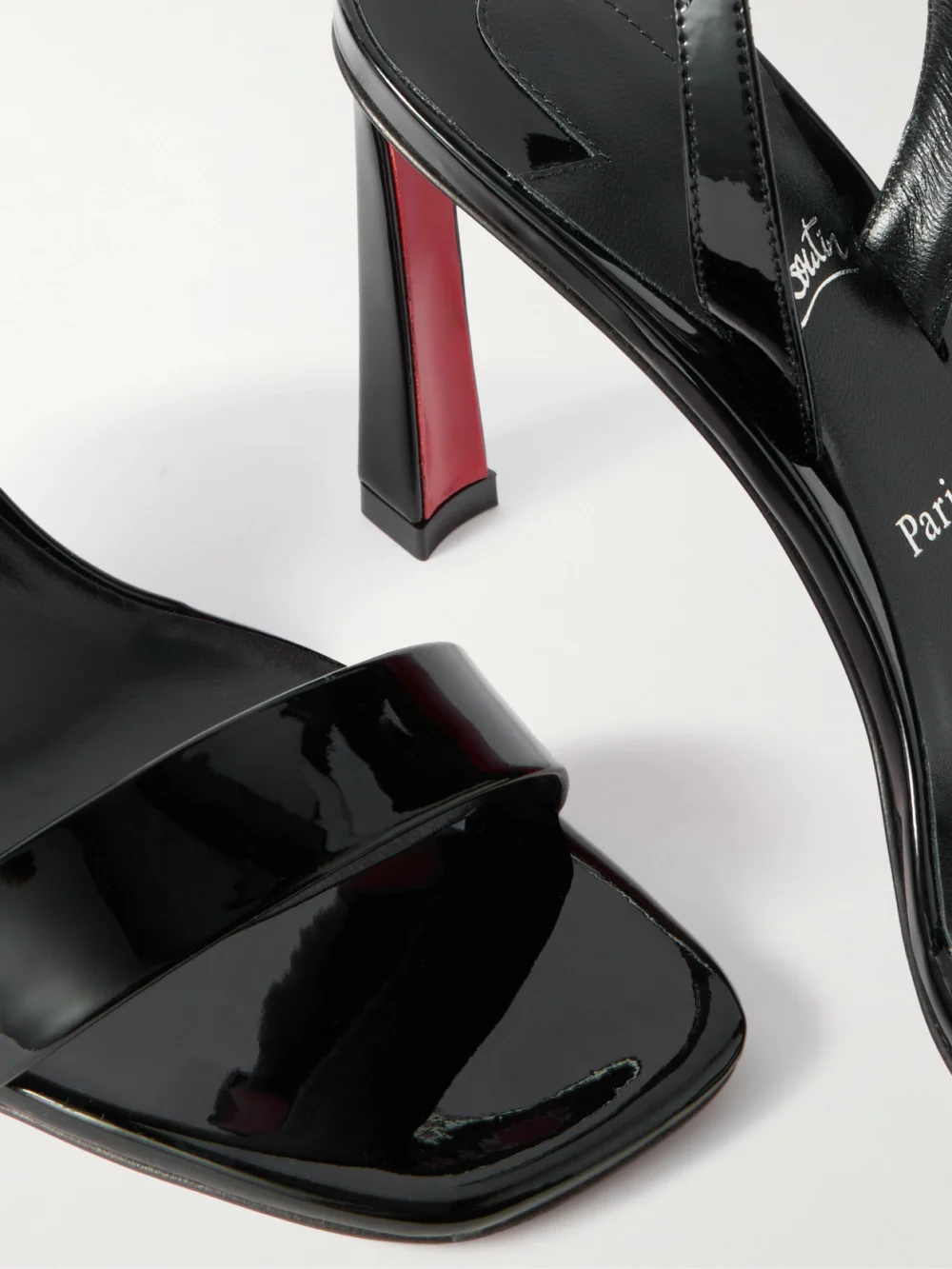 Close-up detail of the Christian Louboutin O Condora 85 Patent-leather Slingback Sandals