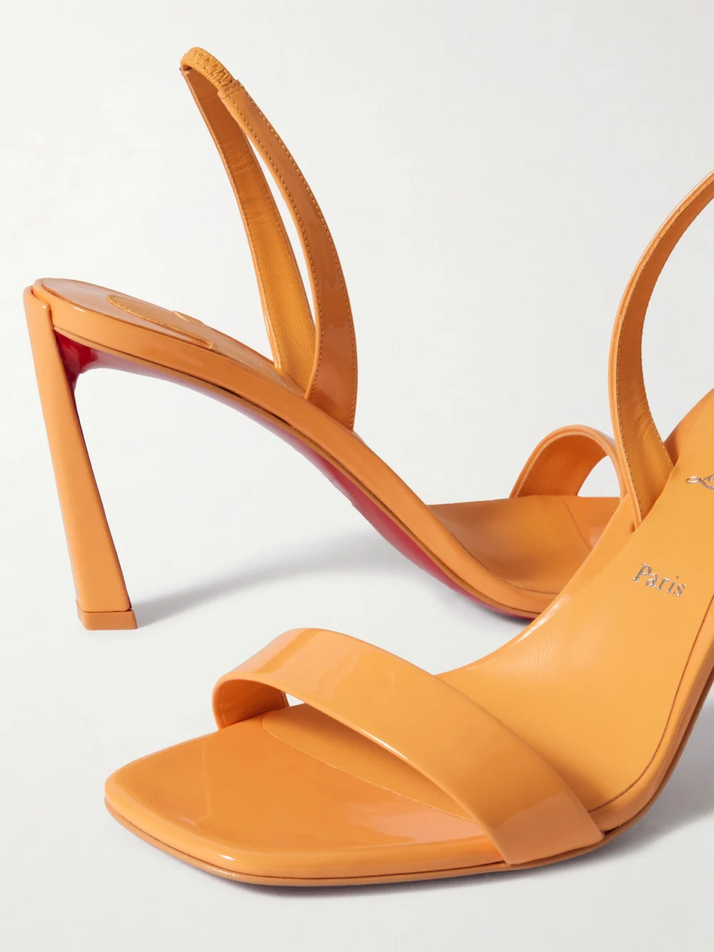Close-up detail of the Christian Louboutin O Condora 85 Patent-leather Slingback Sandals