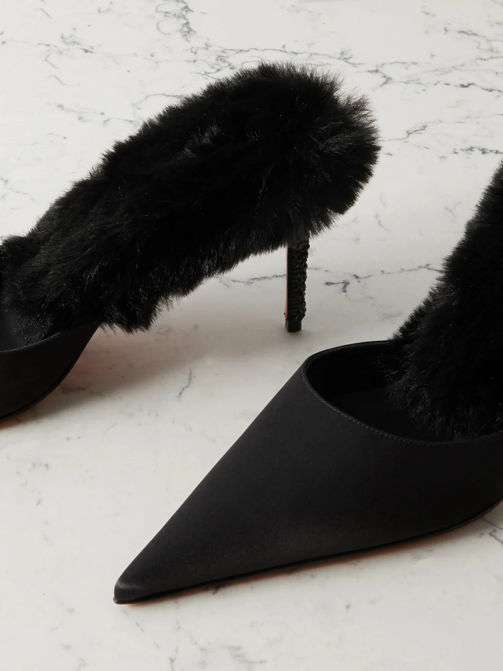 Close-up detail of the Christian Louboutin Plush-trimmed Satin Mules