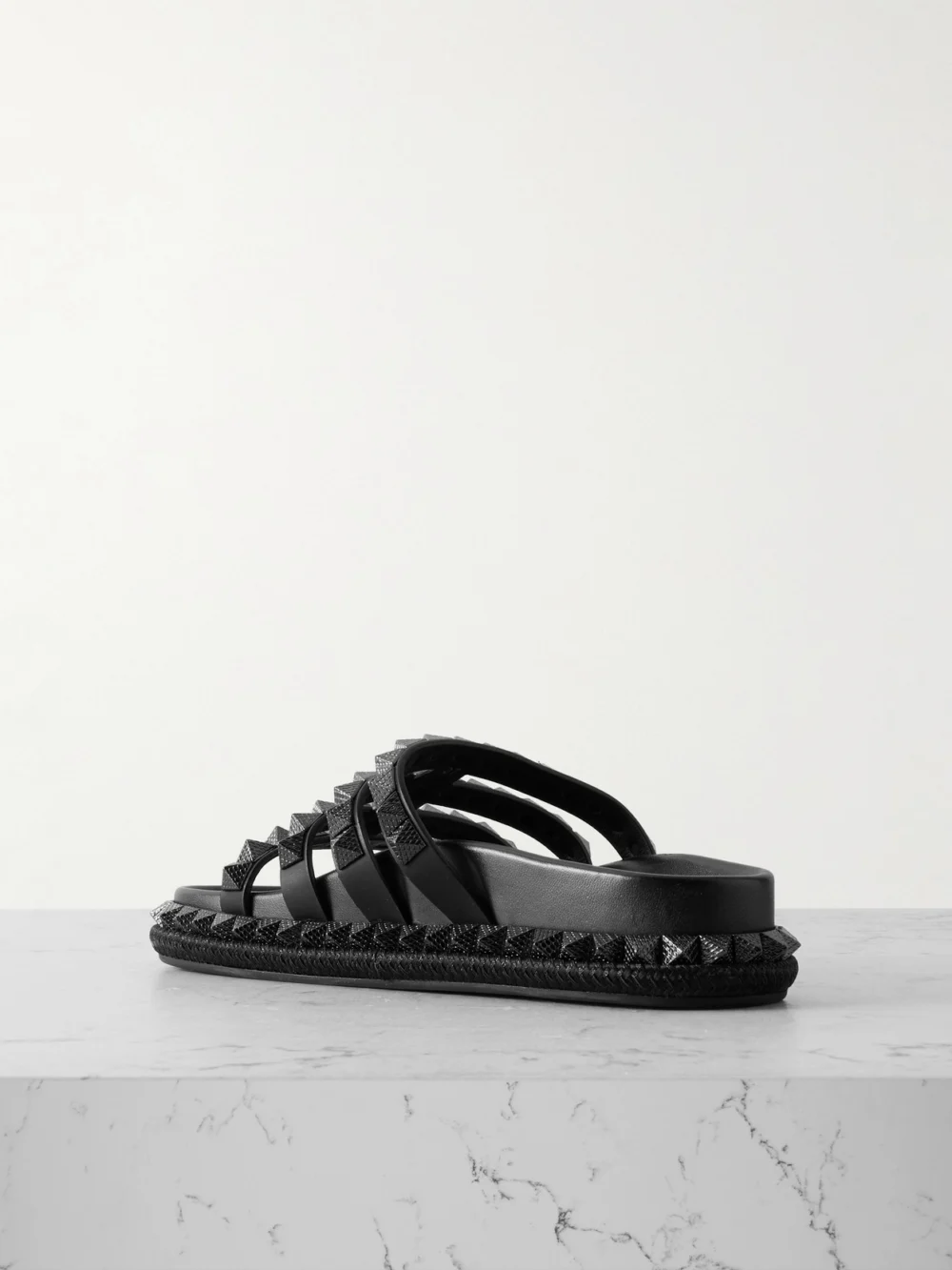Back view of the Christian Louboutin Pyra Hallulila Studded Leather Sandals