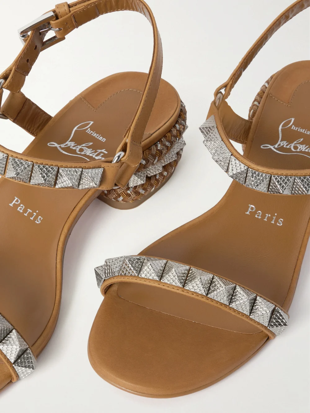 Close-up detail of the Christian Louboutin Pyrasand 30 Studded Leather Sandals
