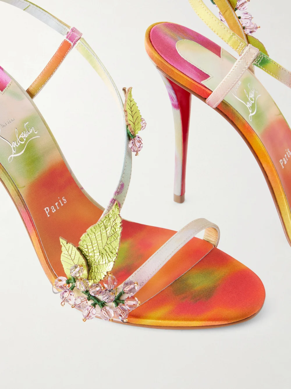Close-up detail of the Christian Louboutin Rosa Fruit 100 Embellished Leather-trimmed Satin Sandals