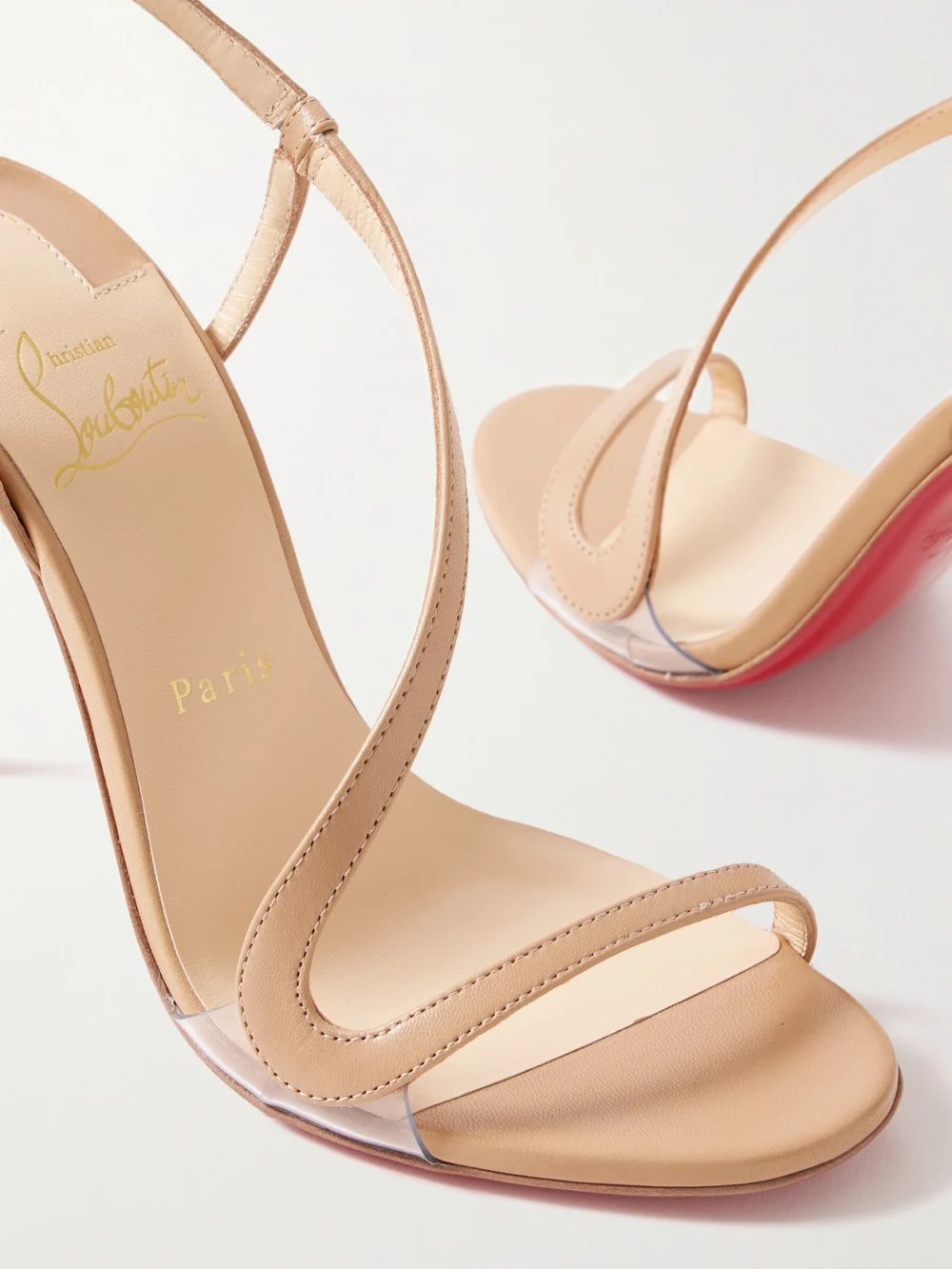 Close-up detail of the Christian Louboutin Rosalie 100 Pvc-trimmed Leather Sandals