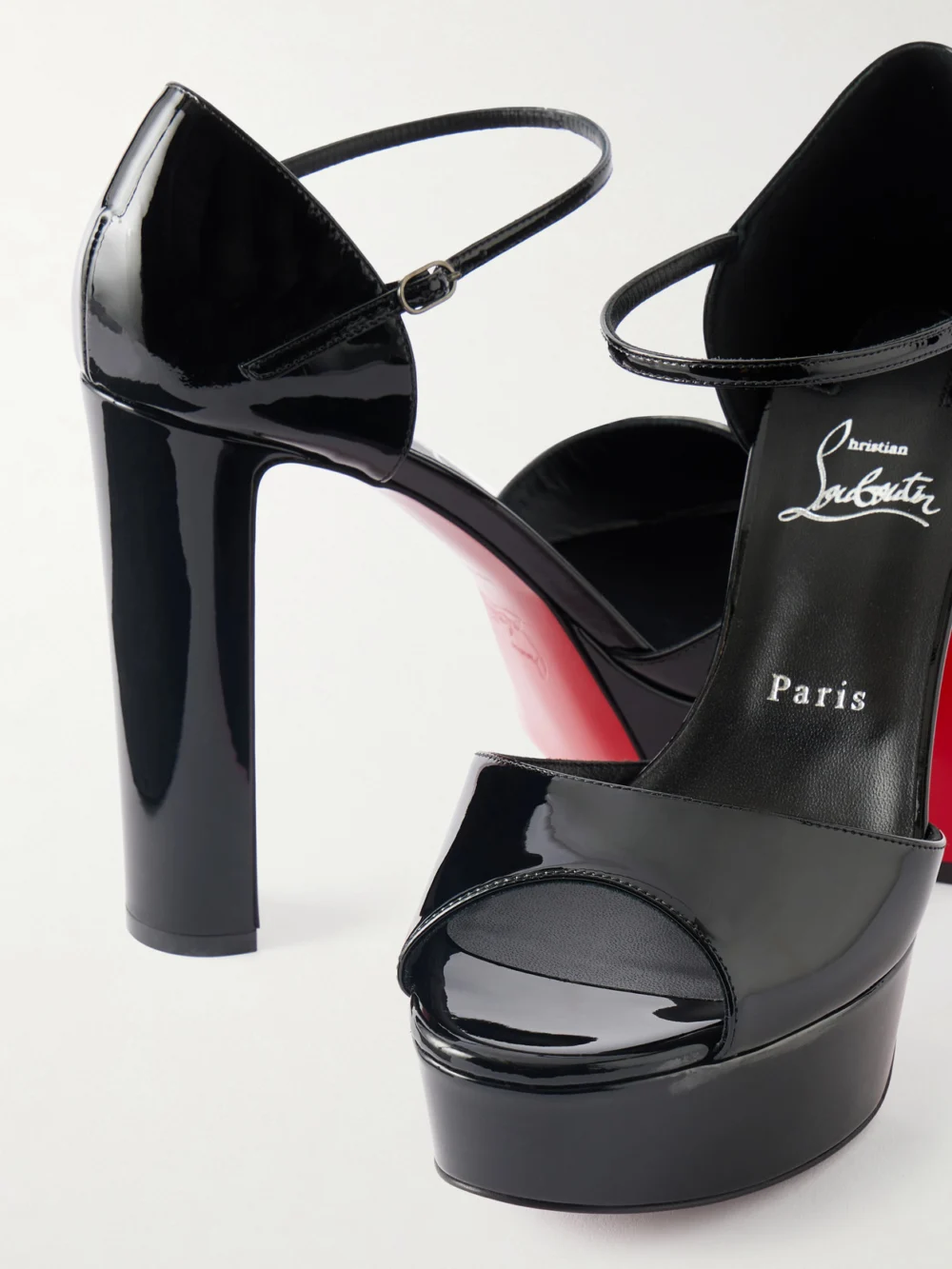 Close-up detail of the Christian Louboutin Sandaloo 130 Mirrored-leather Platform Sandals