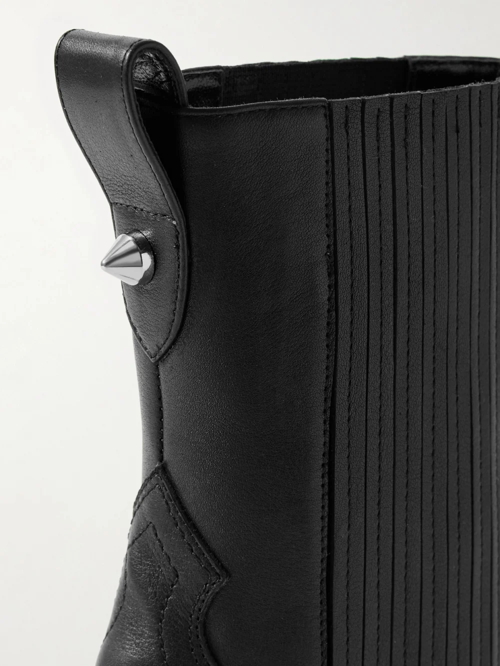 Close-up detail of the Christian Louboutin Santigag 85 Leather Ankle Boots