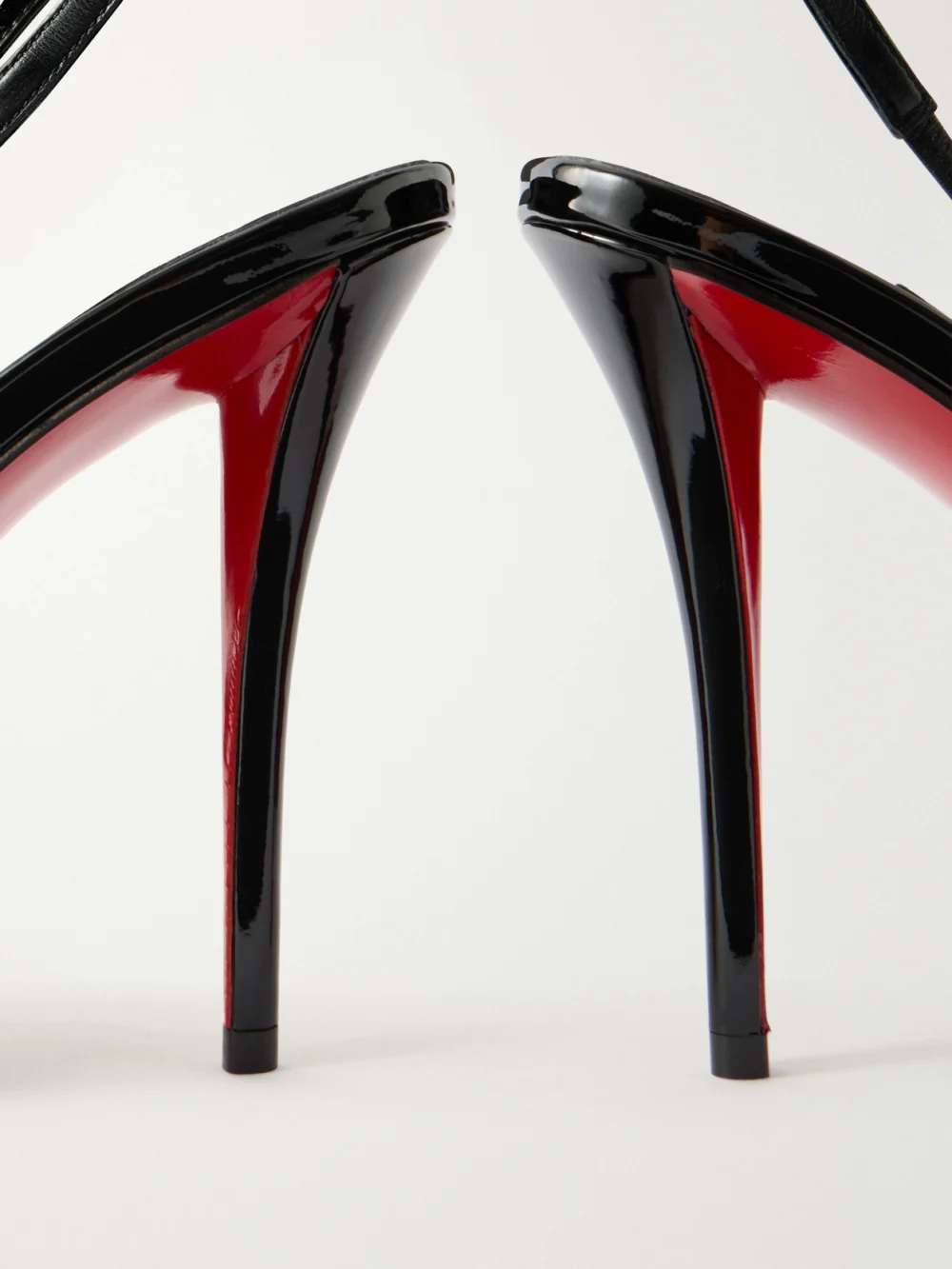 Close-up detail of the Christian Louboutin Sofia Z 100 Leather Slingback Sandals