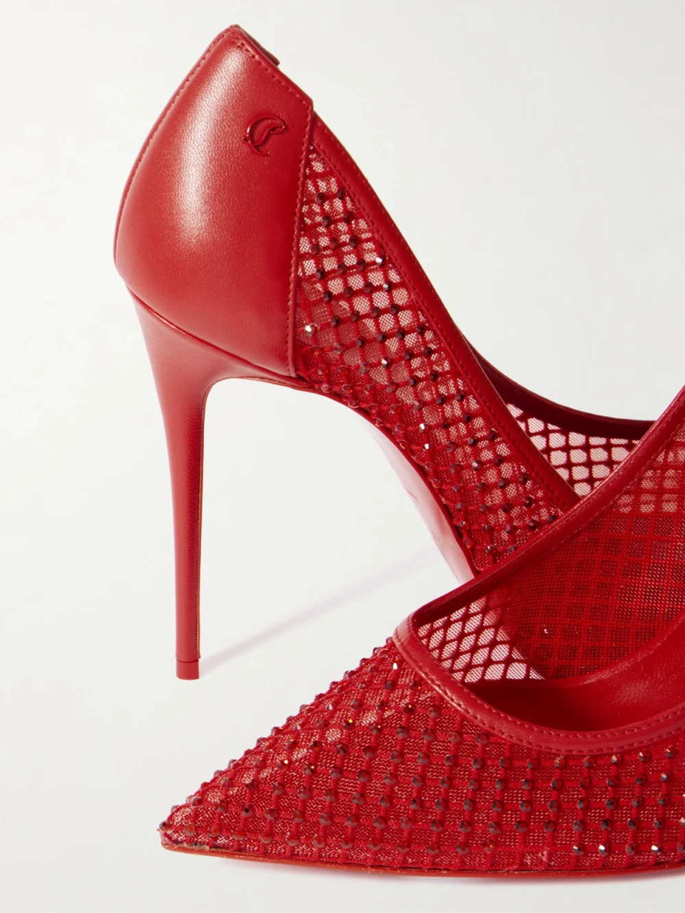 Close-up detail of the Christian Louboutin Sporty Kate 100 Crystal-embellished Leather-trimmed Mesh Pumps