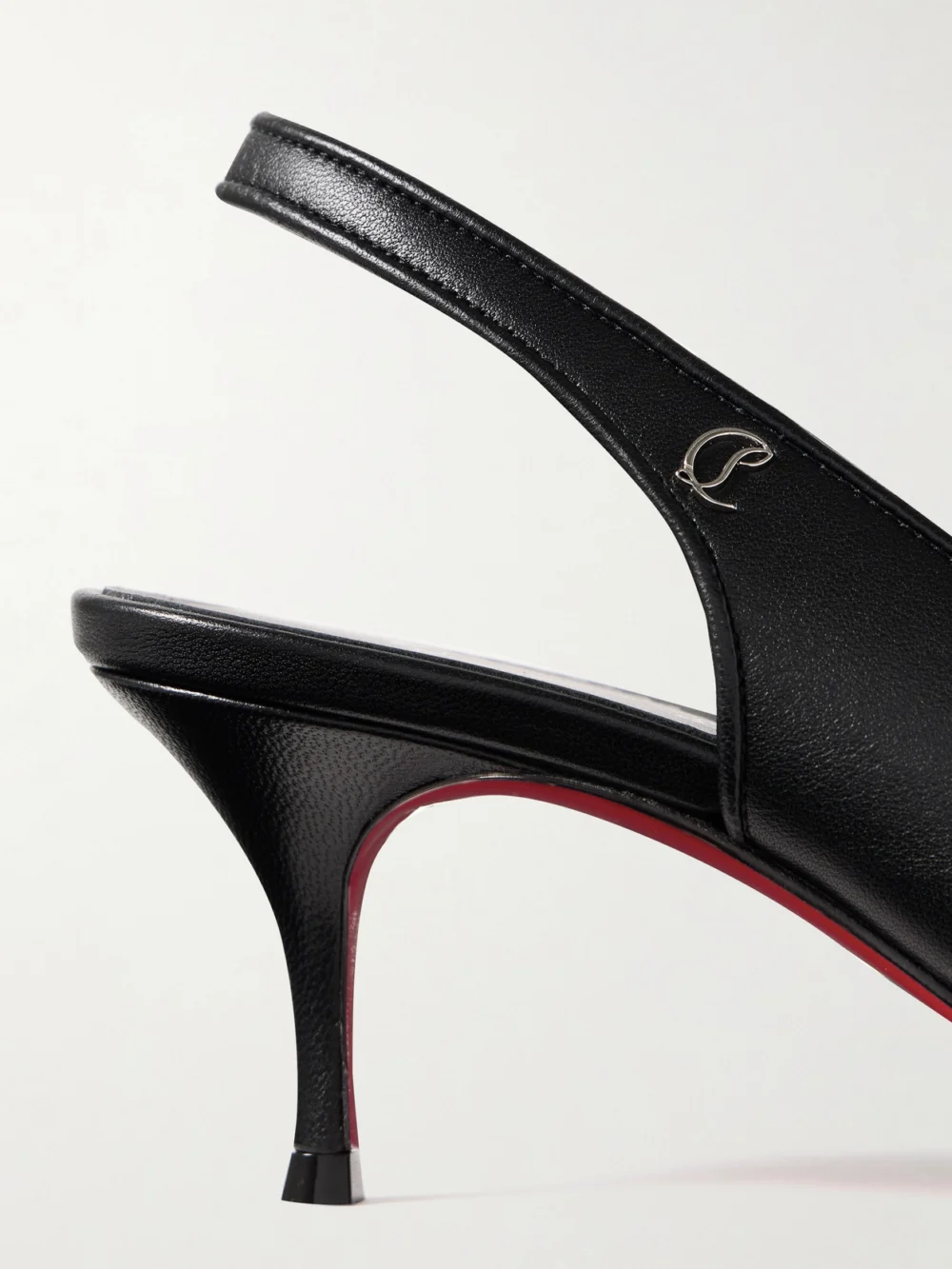 Close-up detail of the Christian Louboutin Sporty Kate 45 Leather Slingback Pumps