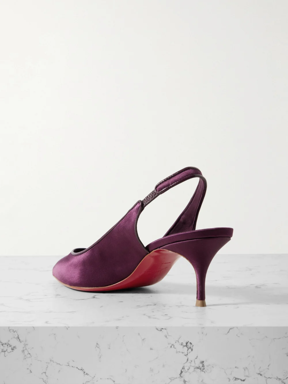Back view of the Christian Louboutin Sporty Kate 55 Satin-crepe Slingback Pumps