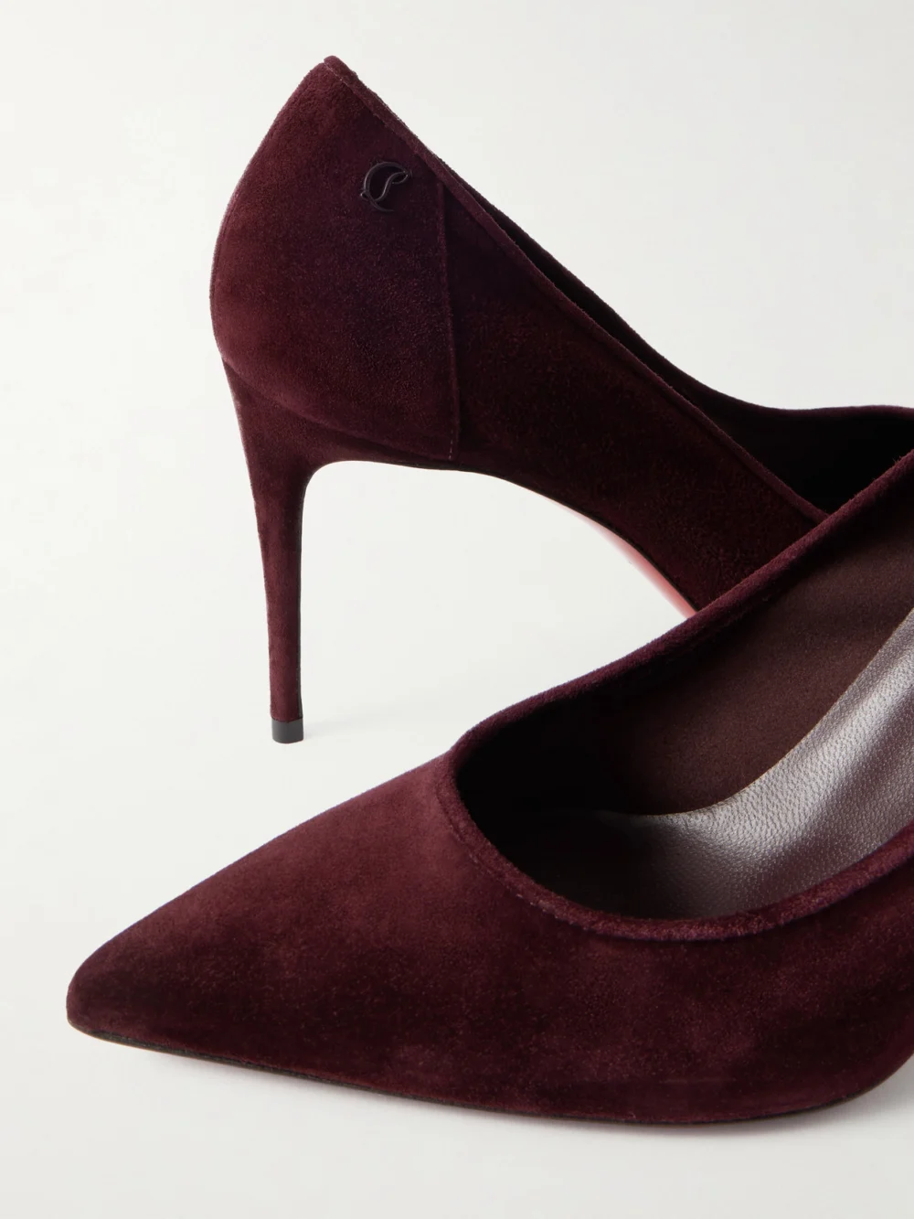 Close-up detail of the Christian Louboutin Sporty Kate 85 Suede Pumps
