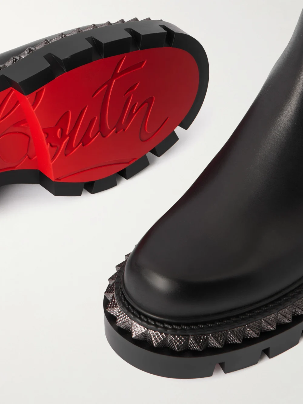 Close-up detail of the Christian Louboutin St Emilia Pyraclou Studded Leather Chelsea Boots