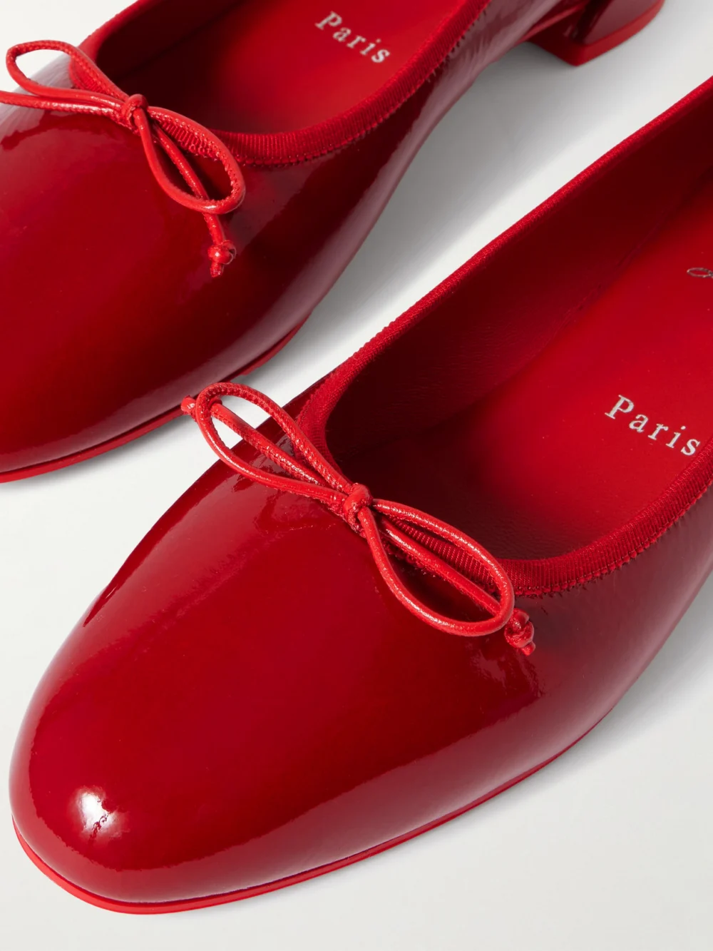 Close-up detail of the Christian Louboutin Sweetie Jane Patent-leather Flats