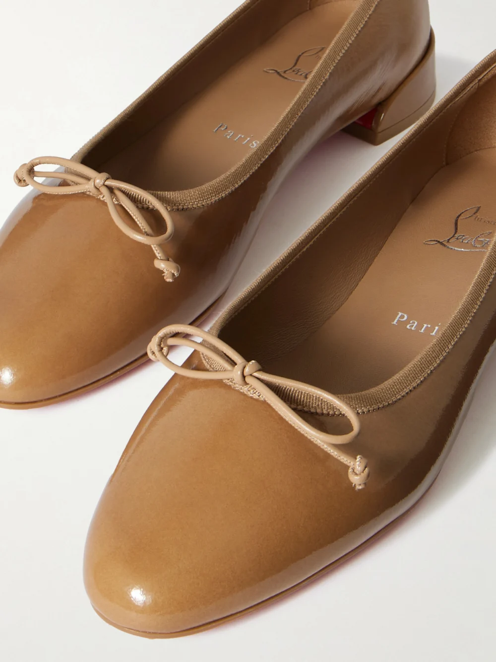 Close-up detail of the Christian Louboutin Sweetie Jane Patent-leather Flats