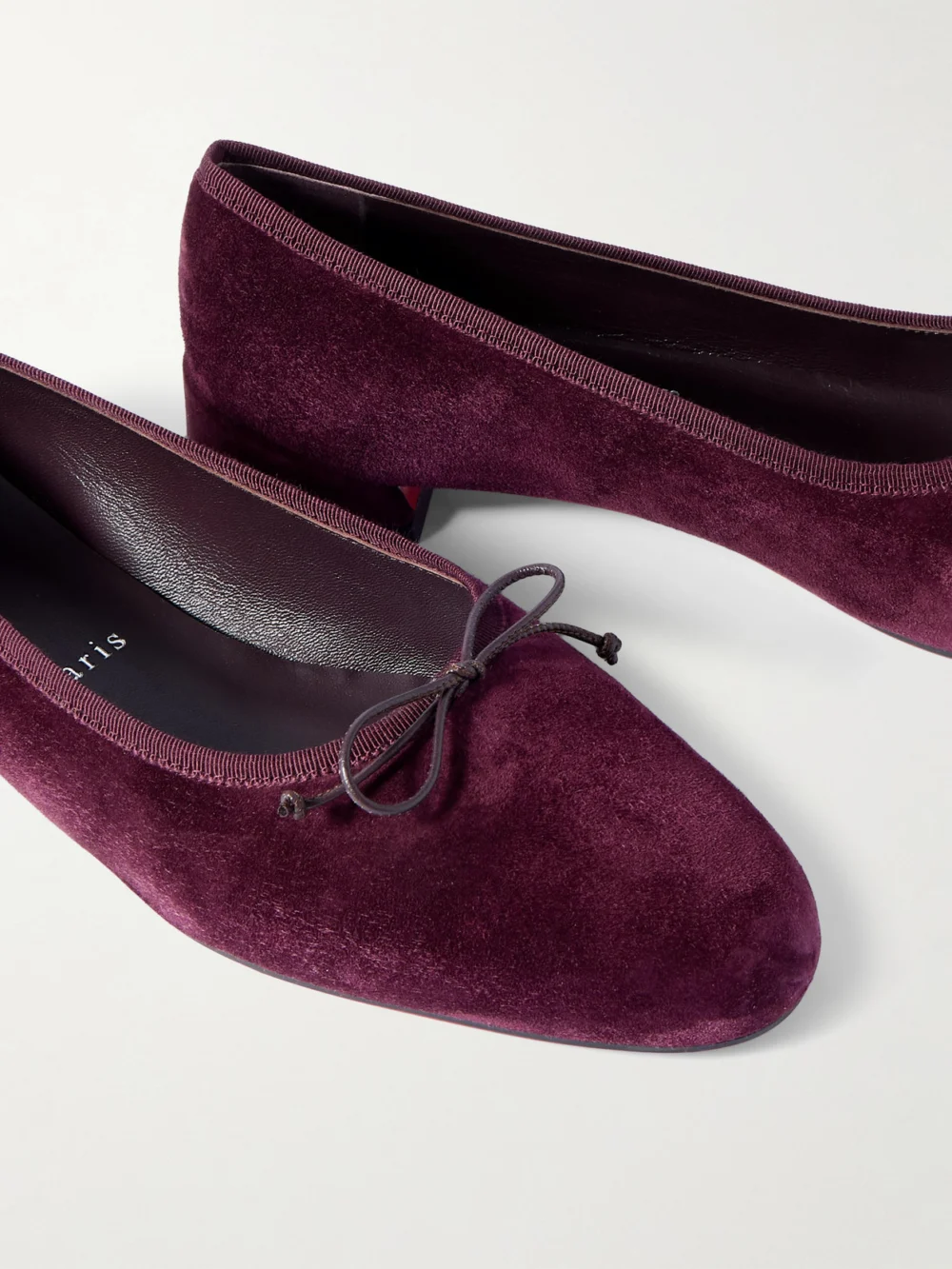 Close-up detail of the Christian Louboutin Sweetie Jane Suede Ballet Flats