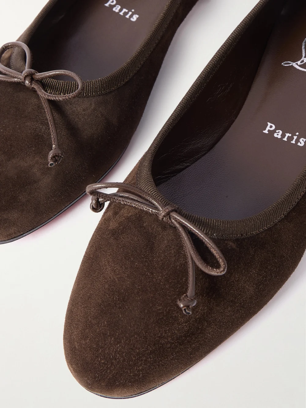 Close-up detail of the Christian Louboutin Sweetie Jane Suede Flats