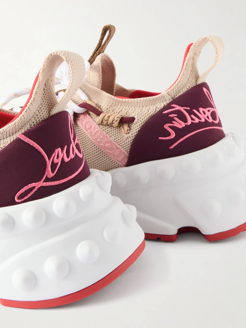 Close-up detail of the Christian Louboutin Trailnrun Studded Embroidered Velour and Suede-trimmed Stretch-knit Sneakers