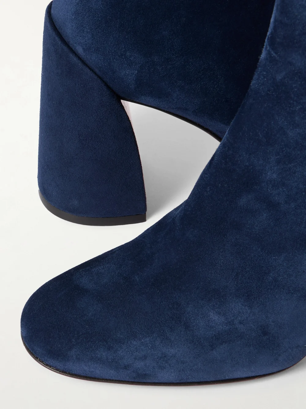 Close-up detail of the Christian Louboutin Turela 85 Suede Ankle Boots