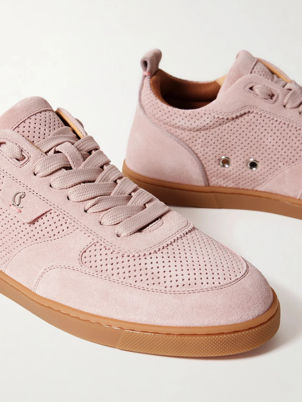 Close-up detail of the Christian Louboutin Tutti Rui Donna Perforated Suede Sneakers