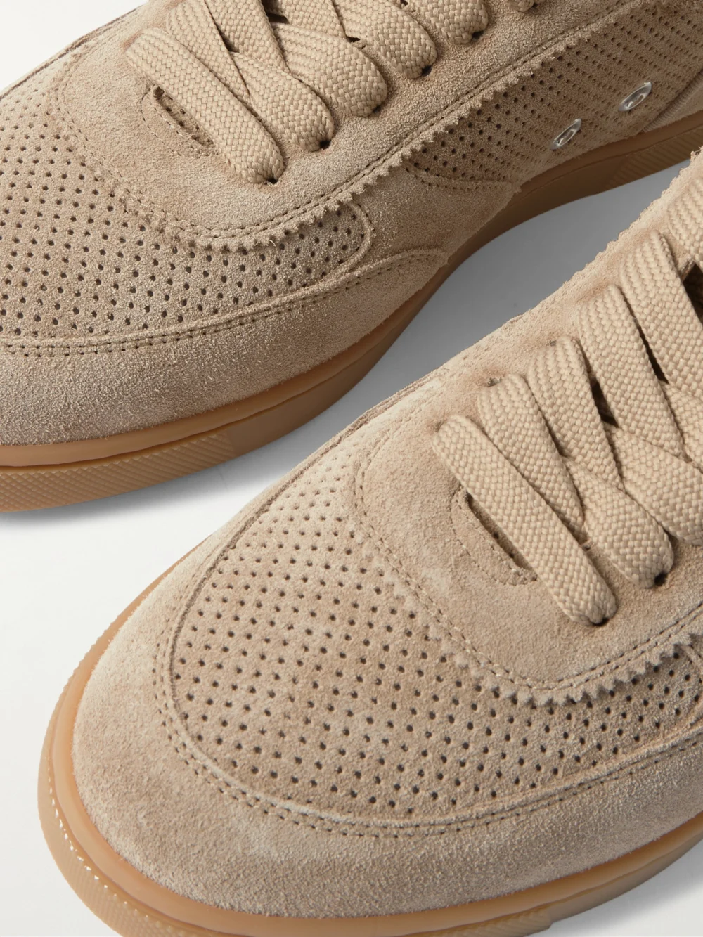 Close-up detail of the Christian Louboutin Tutti Rui Donna Perforated Suede Sneakers