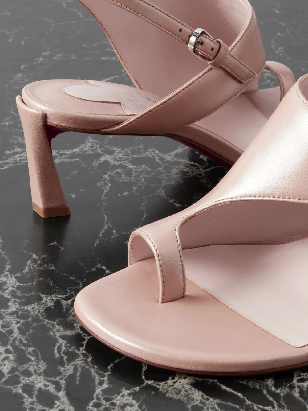 Close-up detail of the Christian Louboutin Viva Condora 55 Leather Slingback Sandals