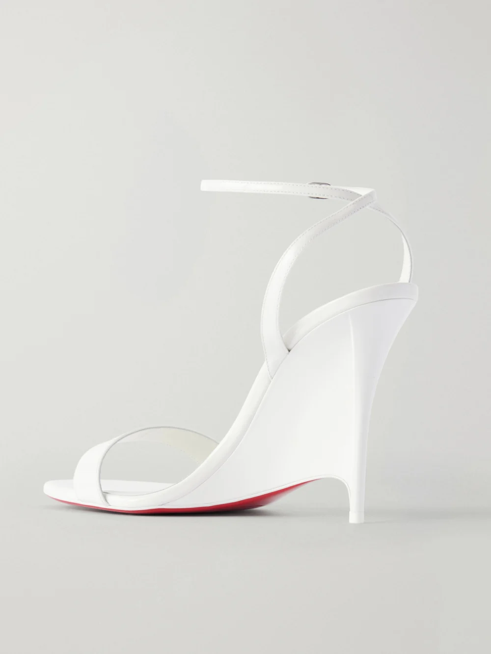 Back view of the Christian Louboutin Zeezeenella 110 Patent-leather Wedge Sandals