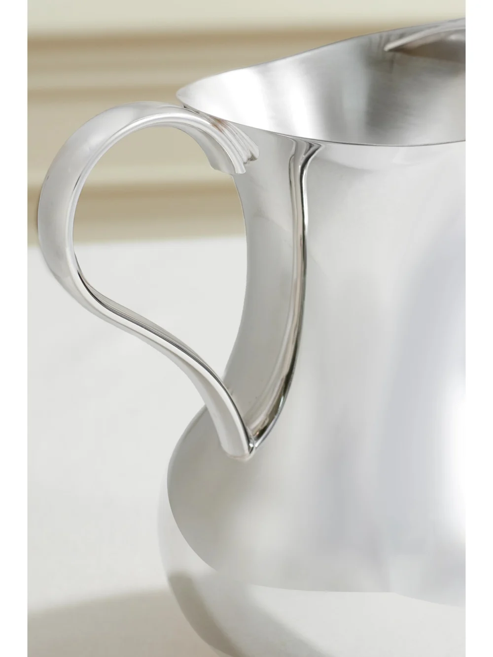 Close-up detail of the Christofle Albi Silver-plated Water Pitcher