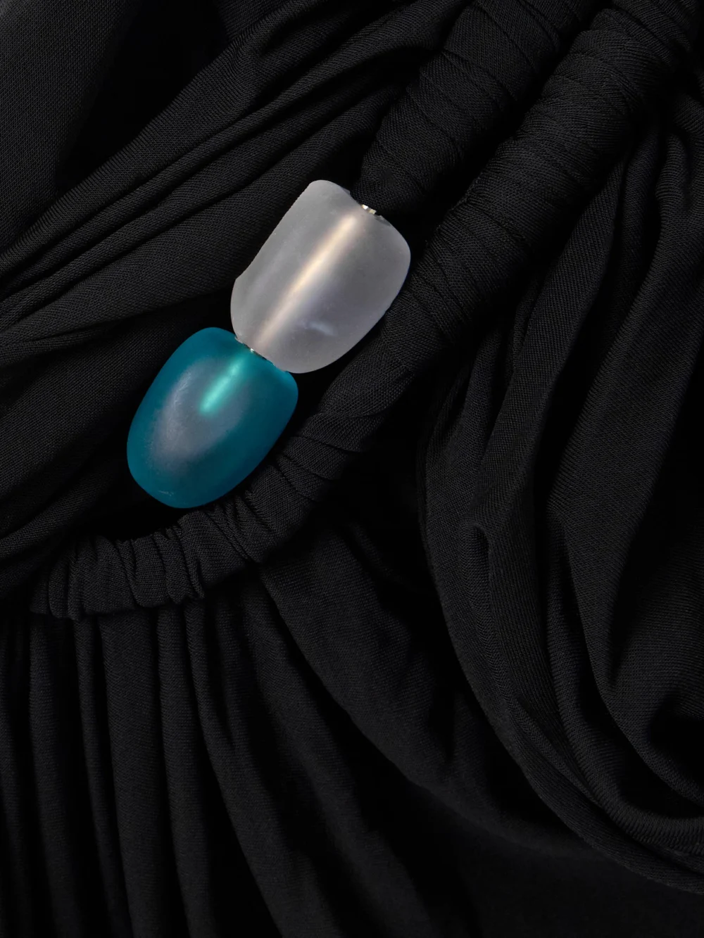 Close-up detail of the Christopher Esber Beach Glass Ruched Asymmetric Jersey Mini Dress