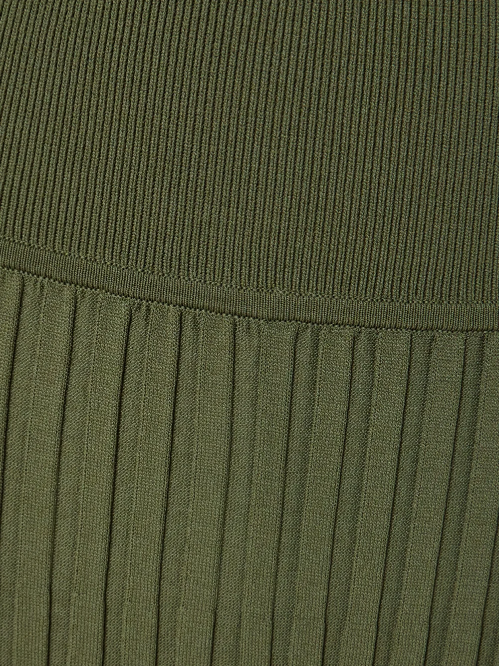 Close-up detail of the Christopher Esber Sunray Strapless Cutout Ribbed-knit Dress