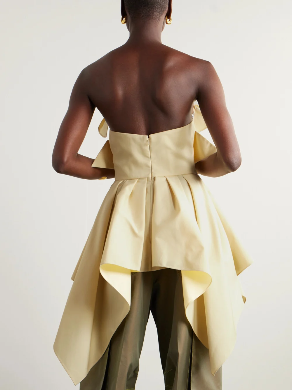 Back view of the Christopher John Rogers Bow-embellished Off-the-shoulder Twill Top