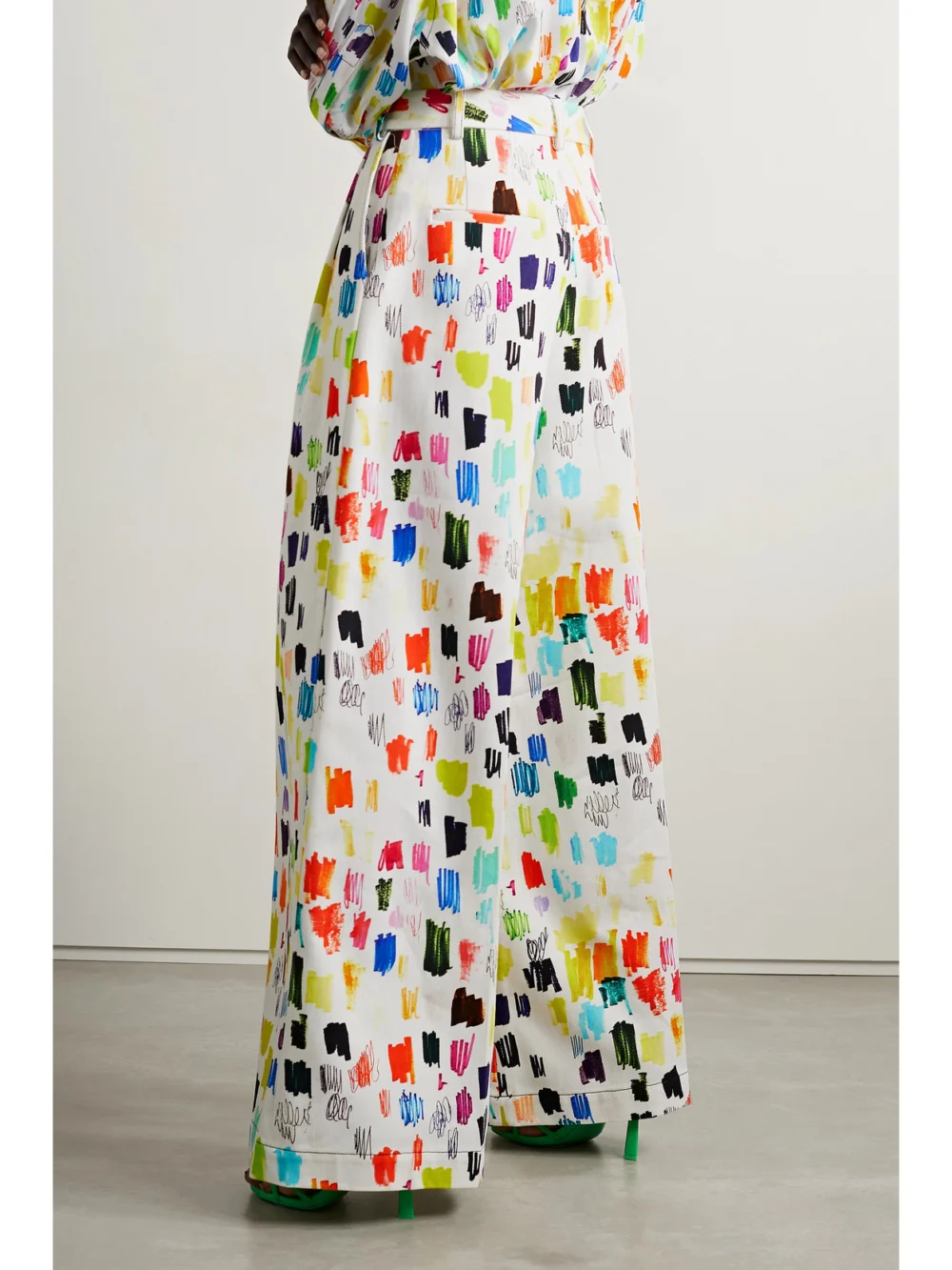 Back view of the Christopher John Rogers Marker Test Pleated Printed Cotton-twill Wide-leg Pants