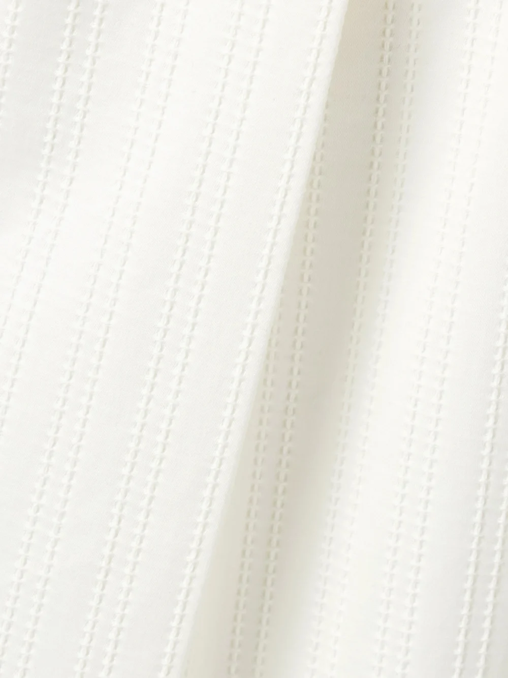 Close-up detail of the Christopher John Rogers Pleated Embroidered Cotton Wide-leg Pants